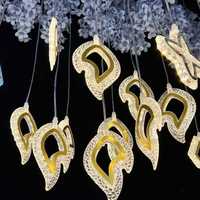 Lustre en cristal acrylique et guirlande de citrouille pour la décoration murale de fond de mariage et de festival avec lumière chaude