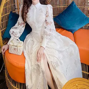 Оптовая продажа вьетнамского кружевного платья с вышивкой и длинными рукавами для весны 2023, яркое платье знаменитости