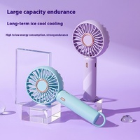 Nouvelle mode Simple petit ventilateur à main USB charge extérieur pratique suspendu Mini ventilateur