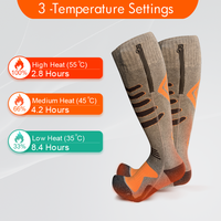 Chaussettes chauffantes électriques rechargeables à 3 modes, chaussettes thermiques d'hiver USB avec poche zippée, design doux et respectueux de la peau, offrant un soutien aux pieds