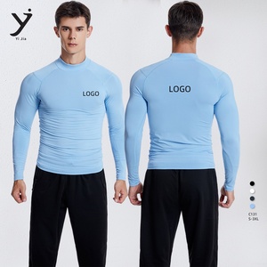 Capa base deportiva de manga larga de secado rápido ajustada con botones para hombres para juegos de pelota de fitness correr y entrenar - Product Image 1
