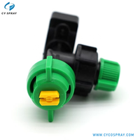 Buse de pulvérisation à clipser en plastique, avec bouchon à vis vert, embout jaune et corps noir, pour lignes de refroidissement et de lavage