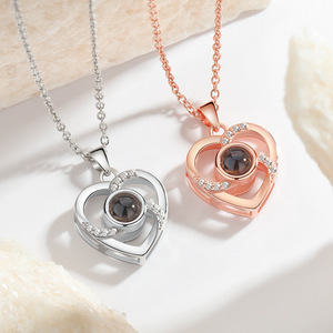 Collar con Colgante de Piedra de proyección de <span class=keywords><strong>cien</strong></span> <span class=keywords><strong>idiomas</strong></span>, <span class=keywords><strong>te</strong></span> <span class=keywords><strong>amo</strong></span>, collar de piedra de proyección de corazón hueco, regalos para mujeres - Product Image 1