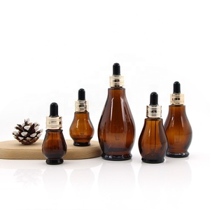 Flacon compte-gouttes <span class=keywords><strong>en</strong></span> verre ambré <span class=keywords><strong>en</strong></span> forme de <span class=keywords><strong>gourde</strong></span> de 10 ml à 100 ml, conteneur pour huile essentielle et sérum, emballage personnalisé pour soins de la <span class=keywords><strong>peau</strong></span> avec bouchon à vis et logo sur mesure - Product Image 4