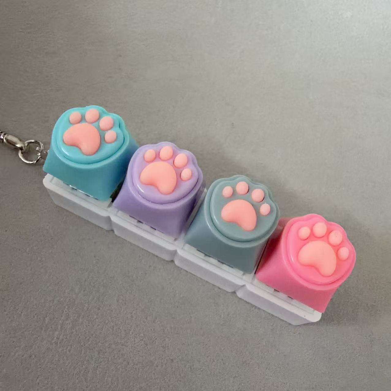 Coque blanche à quatre boutons - patte de chat en silicone bleu-violet-gris-rose