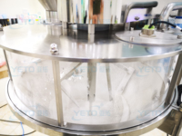 Machine de remplissage semi-automatique à haute productivité pour poudres et granulés, pour l'emballage de produits cosmétiques, chimiques et alimentaires, avec options de conditionnement en sachets et en barils.