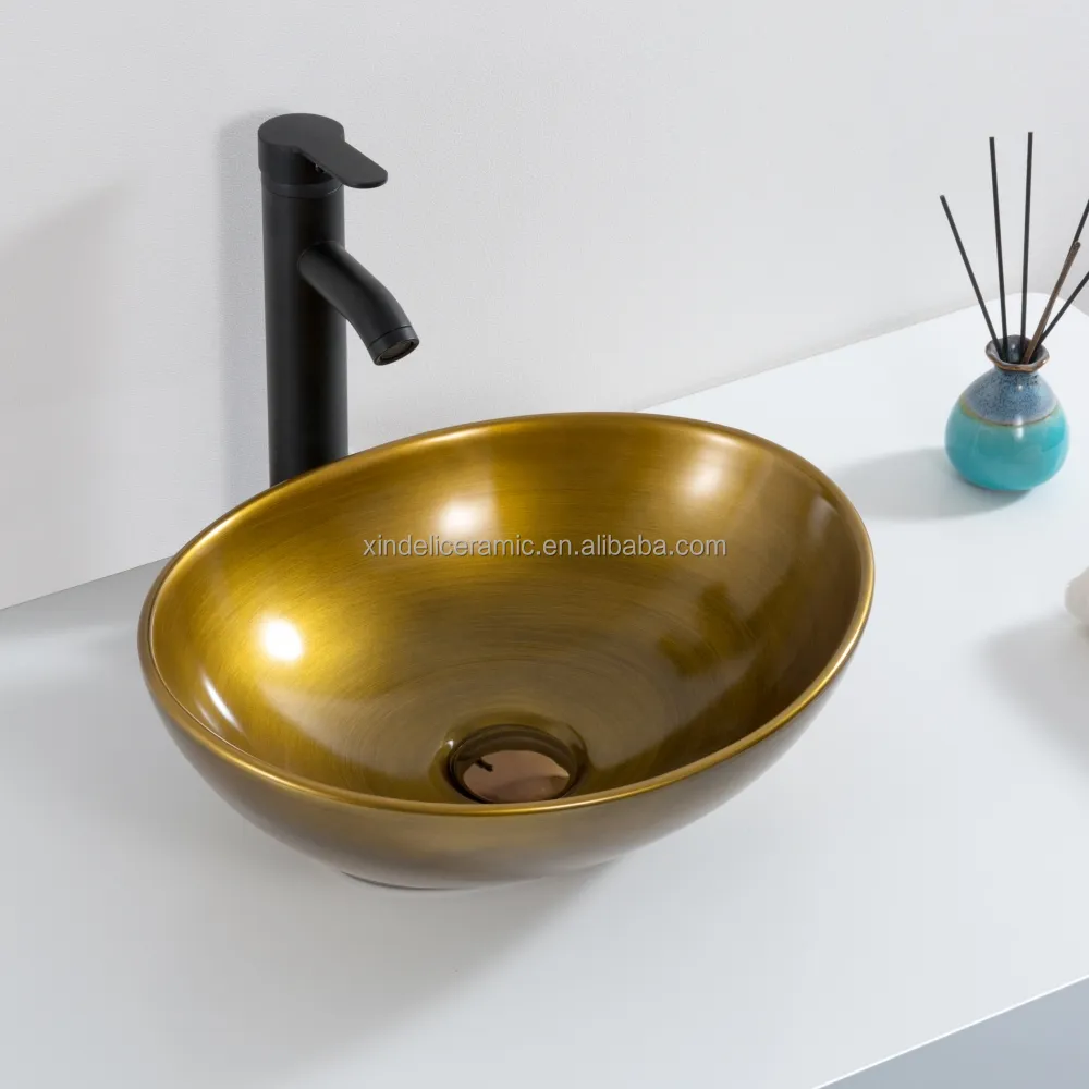 Lavabo de cerámica ovalado de lujo para baño, lavamanos pequeños de latón amarillo y cobre rojo