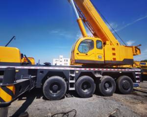 رافعة شاحنة QY 100K-I بحالة جيدة ، رافعة قوية 306kw ، رافعة رخيصة الثمن - Product Image 1