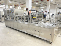 Biscuit bâton entièrement automatique à haute production avec remplissage de tasse de sauce au chocolat et machine à sceller le papier d'aluminium avec des jouets