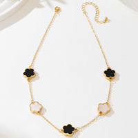 Élégant Simple Polyvalent Femmes Mode Ensemble de Bijoux 2 Pièces Métal Noir Blanc Épissage Chaîne Trèfle Bracelet Collier Alliage
