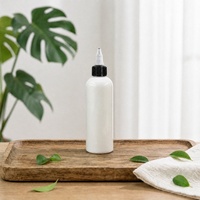 Bouteille souple personnalisée en PET blanc avec bouchon torsadé pour huile capillaire, lotion pour le cuir chevelu, après-shampoing de salon – Vente en gros et emballage en vrac