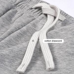 กางเกงวิ่งขาสั้นผู้ชายผ้าฝ้ายมีกระเป๋ากางเกงขาสั้นออกกำลังกายในยิมแบบลำลองสำหรับสตรีทแวร์ลายสีทึบและการพิมพ์ดิจิตอล - Product Image 3