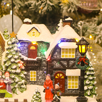 Ensemble de Noël avec lumières LED pour village de Noël, traîneau de rennes en mouvement et patineurs en résine
