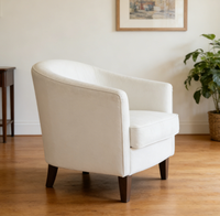 Fauteuil d'appoint moderne et minimaliste en velours blanc, avec accoudoirs incurvés et pieds coniques en bois massif, pour hôtel et usage domestique