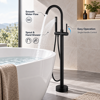 Robinet de baignoire monocommande au design moderne, à poser au sol, en laiton poli finition noire, avec cartouche céramique et jet doux