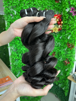 Paquets d'extension de cheveux vierges bruts vendeurs de paquets de cheveux humains à vague lâche en gros pour les noirs