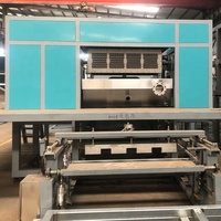 Machine automatique CE à 4 côtés pour la fabrication de plateaux à pommes et de boîtes à œufs à partir de papier recyclé, populaire en Turquie, en Ukraine, au Pérou, en Malaisie et au Mexique
