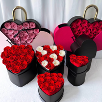 Vente en gros de roses éternelles à tête de fleur pour toujours roses conservées dans une boîte en forme de cœur