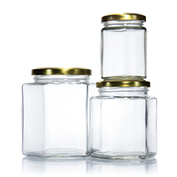 Pot et bouteille de miel avec impression de logo personnalisé emballage en carton cadeau boîte hexagonale de luxe emballage pour le miel