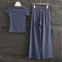 Vêtements pour femmes en gros, nouvelle mode, ensemble décontracté en jacquard, haut à manches courtes et pantalon long