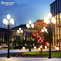 Lampadaire de jardin extérieur étanche en aluminium, design lotus, 5 têtes, hauteur personnalisable 2-4,5 m, pour projets d'éclairage paysager de villas et cours.