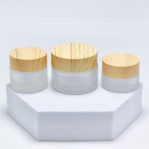 Custom Label Round <b>Glass</b> Jar 50g Cosmetic <b>Packaging</b> with Wooden Color Lid Frosted <b>Glass</b> Cosmetic Cream Jar - Product Image 5