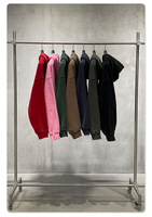 Herensweater met stone washed antieke look, oversized boxy fit, zware fleecevoering en dubbele ritssluiting.