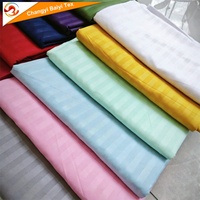 Tissu en microfibre de polyester léger gaufré à rayures 80-100 g/m² doux et respirant pour vêtements africains et produits textiles de maison