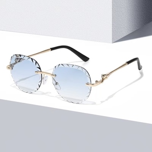 Leopard Framelessトリミングサングラス<span class=keywords><strong>2025</strong></span>新しい丸波サングラスヨーロッパとアメリカのファッショントレンドサングラス女性のための - Product Image 1