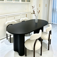 Table à manger ovale en dalle de roche française, petite table à manger moderne minimaliste haut de gamme et combinaison de chaises