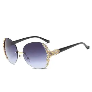 778 nuova moda moda occhiali da sole donne metallo senza montatura occhiali da sole donna Bling Logo personalizzato occhiali da sole di lusso