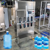 Machine de remplissage à gravité à deux étages anti-éclaboussures pour liquides à forte formation de mousse