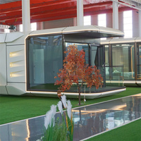 Maison mobile de luxe Capsule spatiale Suite de luxe Mur de verre Petite maison Belle chambre Usine de Chine Maison intelligente Chambre de vacances Scénique