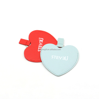 Petit miroir de maquillage portable en cuir PU fantaisie avec deux pendentifs breloques pour sac