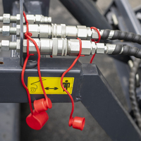 Chargeuse compacte sur chenilles avec accessoire de tranchage, machine hydraulique pour le creusement de canalisations et les travaux de construction