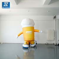 Modèle de tasse à bière gonflable personnalisée en forme de ballon de football de dessin animé pour événements sportifs en plein air, publicité promotionnelle, décoration