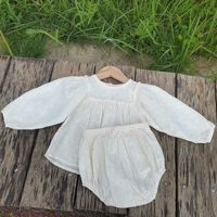 Nouvelle collection de vêtements pour enfants style coréen, ensemble bébé printemps-automne en coton brodé, chemise de poupée pour fille + short à col et motif fesses volumineuses