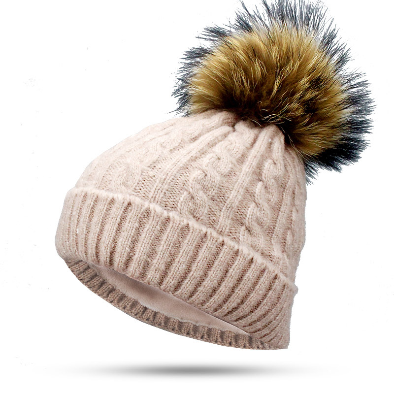 Bonnet d'hiver en laine tricotée avec pompon en fourrure de raton laveur pour femme