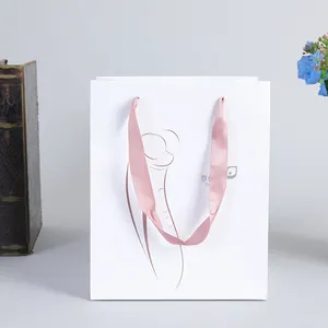 Boutique recycelbare mittelgroße Luxus-Einkaufstaschen aus glänzendem weißem Euro-Einkaufs papier mit ausgefallenem lila Seil griff mit Logo