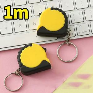 Mètre Ruban Promotionnel Portable Mini en Acier de 1M avec Revêtement en Caoutchouc et Logo Personnalisé pour Porte-clés - Product Image 4