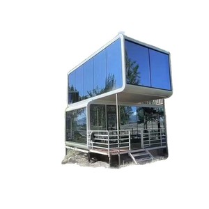 Maison conteneur moderne sur roues pour hôtel, usage extérieur, avec murs en verre et balcon - Product Image 1