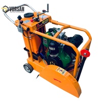 Machine à découper la route à moteur essence, scie à béton manuelle pour le découpage des allées et des chaussées routières sur chantier