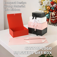 Individuelles Logo Geprägte Glitzer-Elfenbeinkarton Starre Magnetische Geschenkbox für Kleidung Schuh Kerzen Verpackung Kunststoffeinlage Band Aseptisch