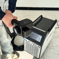 Machine de nettoyage au laser pulsé 500W, portable, pour enlever la rouille, avec tête de soufflage d'air intégrée, pour pierre/PVC/aluminium/bois