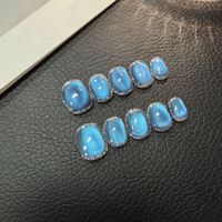Lot de 10 faux ongles de luxe bleus œil de chat, longs et carrés, faits à la main, ovales, en acrylique, avec paillettes, pré-conçus, vente en gros