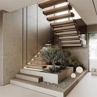 Escaliers flottants sur mesure avec balustrade en verre et bandes de roulement en bois Conception efficace de l'espace pour appartements et villas en duplex