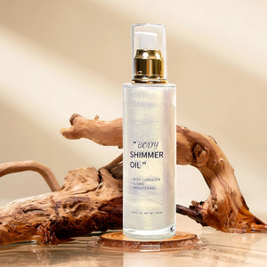 Huile corporelle scintillante MLM 100ml, flacon cylindrique avec bouchon doré, végane, sans cruauté, éclaircissante, nourrissante, ingrédients naturels. - Product Image 5