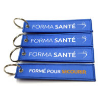 Usine directe OEM ODM Double face tissé étiquette porte-clés personnalisé texte créatif sac de vêtement