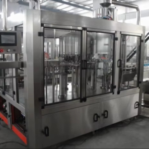 Máquina automática de llenado y tapado de botellas de plástico PET de 500 ml/línea de producción - Product Image 1