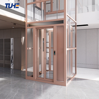 Ascenseur à traction compact et simple pour usage intérieur et extérieur, idéal pour villas et maisons individuelles